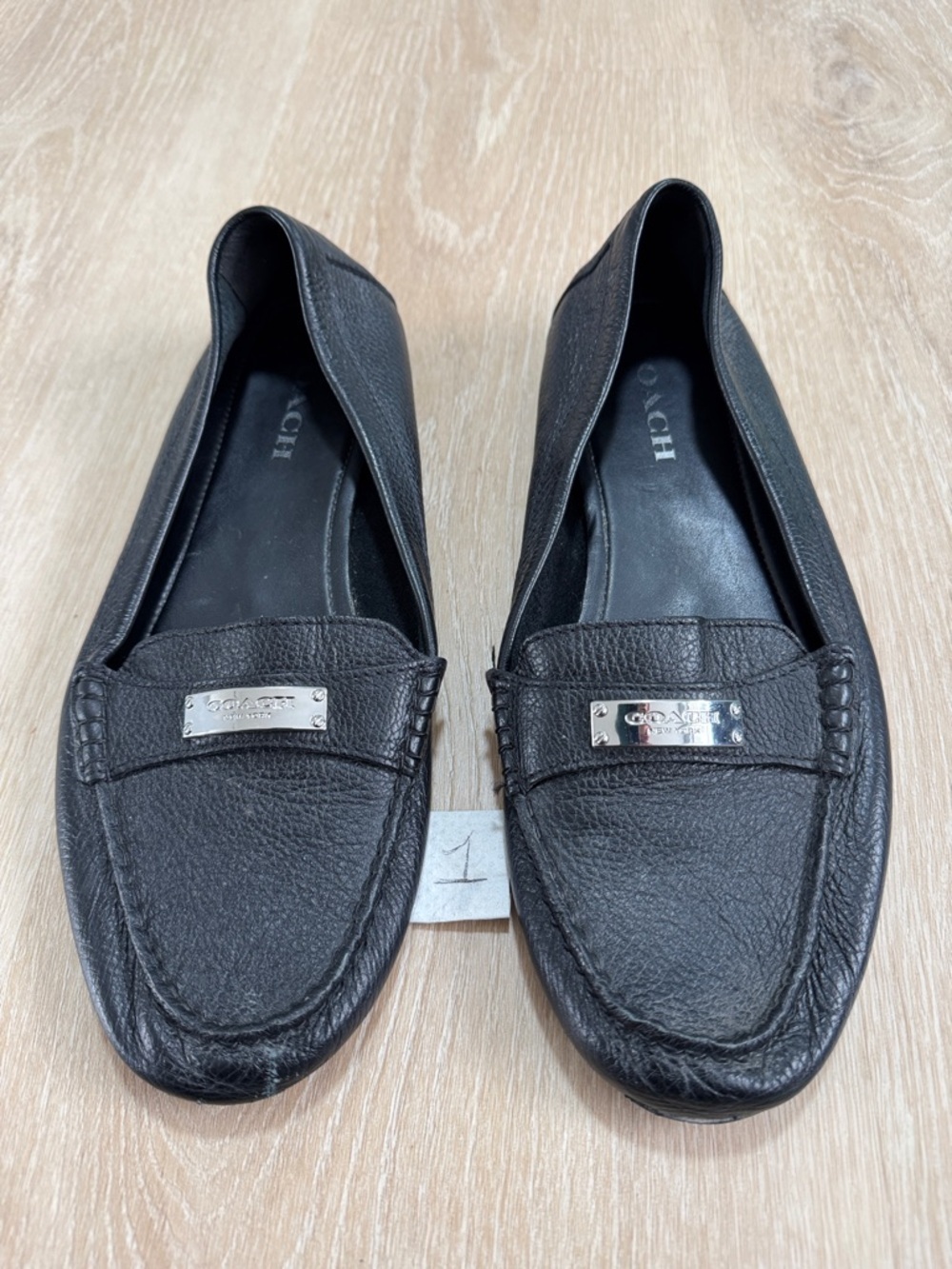 Coach Black Pebbled Leather Penny Loafers with Silver Plaque